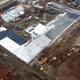 This aerial photo shows excavators and trucks at the construction site of a new hospital being built to treat patients from a deadly virus outbreak in Wuhan in China’s central Hubei province on January 27, 2020.